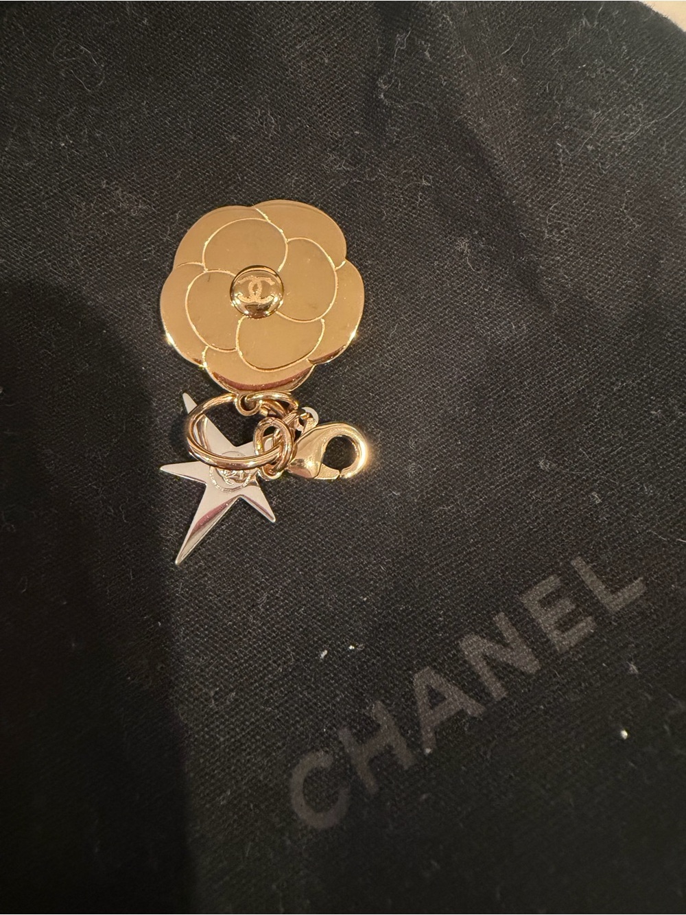 CHANEL Gold Camellia Brooch with Silver Star Charm